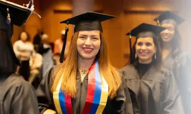 Herzing Oklahoma Online BSN Student Smiling at Graduation Ceremony